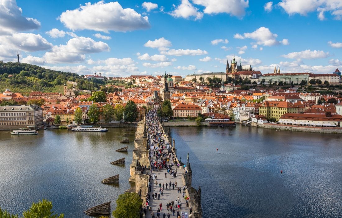 view of mala strana, prague castle, and the Charles Bridge from the Old Town bridge tower